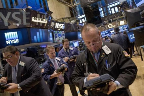 Биржевой трейдер на NYSE. Photo: Reuters.